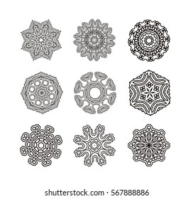 Mandala set. Round ornament pattern. Hand drawn background. Oriental  black and white mandala.  Set of circular patterns or mandalas for coloring book on isolated background. 