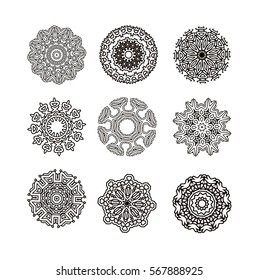 Mandala set. Round ornament pattern. Hand drawn background. Oriental  black and white mandala.  Set of circular patterns or mandalas for coloring book on isolated background. 