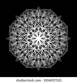 Mandala. Silver round ornament pattern on black background.
