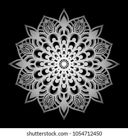 Mandala. Silver round ornament pattern on black background.