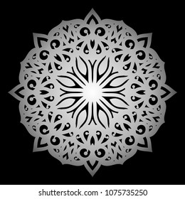 Mandala. Silver round ornament pattern on black background.