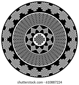 Mandala style Celtic style endless knot symbols in white and black inspired by Irish St Patrick's Day, and Irish and Scottish carving art