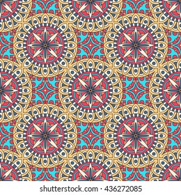 Mandala texture in bright colors. Abstract vector background. Seamless pattern on indian style.