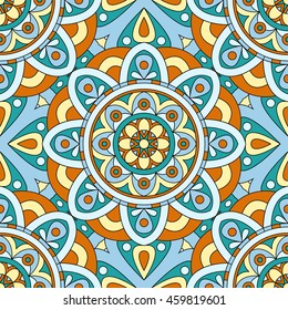 Mandala texture in bright colors. Abstract vector background. Seamless pattern on indian style.