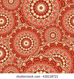 Mandala texture in bright colors. Seamless pattern on indian style. Abstract vector background
