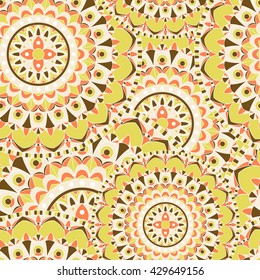 Mandala texture in bright colors. Seamless pattern on indian style. Abstract vector background