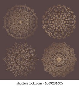 Mandala Vector Design Element. Golden round ornaments. Decorative flower pattern. Stylized floral chakra symbol for meditation yoga logo. Complex flourish weave medallion. Tattoo prints collection