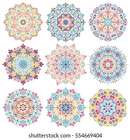 Mandala vector design elements. Round ornament decoration. Colorful blue patterns. Floral motif. Stylized flower. Chakra symbol for meditation yoga logo. Complex flourish weave medallion. Tattoo print