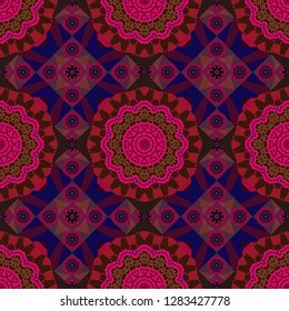 Mandala vector element. Colorful flower seamless pattern. Stylized floral motif in red, purple and brown colors. Round ornament decoration.