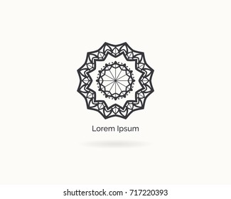 Mandala vector logo design. Round decorative and geometric emblem.