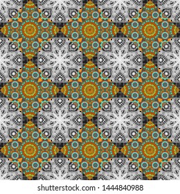 Mandalas kaleidoscope seamless pattern. Composed of orange, gray and blue abstract elements. Useful as design element for texture and artistic compositions. Vector illustration.