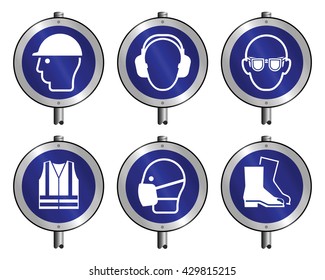 Mandatory construction manufacturing and engineering health and safety signs mounted on posts to current British Standards isolated on white background