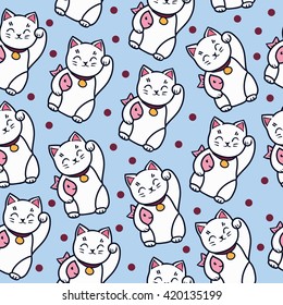 Maneki neko cat with fish seamless pattern.