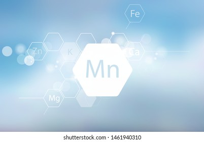Manganese. Abstract composition with the scientific designation of the trace element on a blurred background. Medical research