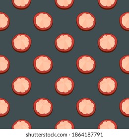 Mangostino a la mitad, sin costura sobre fondo gris oscuro.
