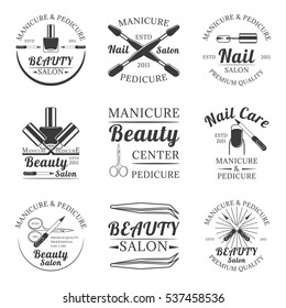 Manicure and pedicure, beauty salon, nail care set of vector vintage emblems, labels, badges and logos in monochrome style on white background