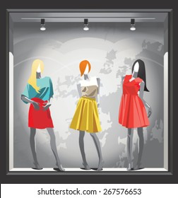 mannequins in bright clothes in a shop window 