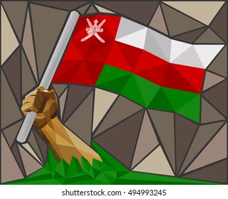 Man's Arm Raising The National Flag Of Oman