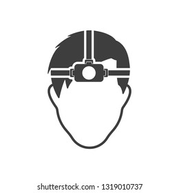 The man's face with a flashlight on his forehead. Vector on white background