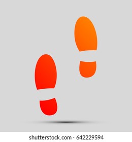 Mans footprints sign. Vector. Orange, red-yellow icon with shadow on gray background.