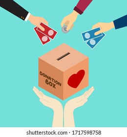 man's hand drop money to donation box and pair hand support below