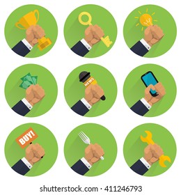 Mans hand holding business symbols icons set. Businessman hand squeeze instruments and attributes in fist flat vector illustration isolated on white. Advertising concepts with things in human arm