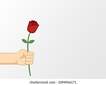 Man's hand holding red rose giving to someone he loves or asking for a date with text space on the right side