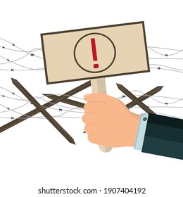 A man's hand holds a sign with an exclamation mark. Barbed wire, fence and barricade. The concept of protest, demands and resistance. Vector illustration. Flat style.