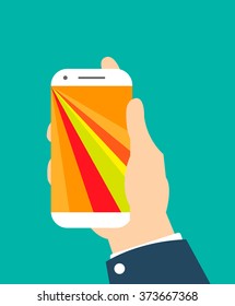 A man's hand is keep a phone