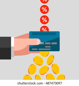 Man's hand is keeping a bank card. Percents are falling in bank card, coins are flying out from card. Receiving a profit from interest rate, cashing of finances