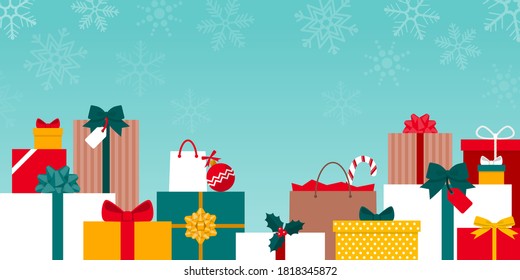 Many colorful Christmas gifts under the snow: holidays and christmas shopping concept