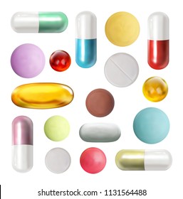 Many colorful pills and tablets isolated on white.