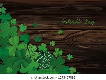 Many decorative clover. A pile of multicolored trelistnikov are on the table.St.Patrick 's Day. Vector illustration. Greeting card with empty space for text or advertising. On a wooden background.