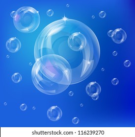 Many different bubbles on blue background