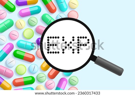 Many different pills and capsules and magnifying glass with EXP inscription, expiration date of medicament. Healthcare and medical concept