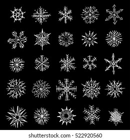 Many different shapes of snowflakes. Drawn by hand. Black and white illustration. icons