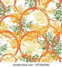 Many handmade ink leaves stamps scattered on white background. Natural autumn, fall seamless pattern. Fabric texture. Beautiful seamless texture background imprint. Orange, green. 