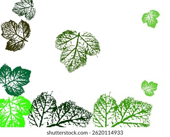 Many handmade ink leaves stamps scattered on white background.  Spring foliage dancing on yellow green background. 