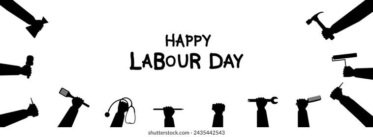 Many hands are raised with different labor symbols. Labor Day.