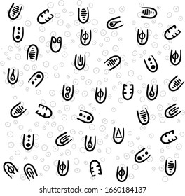 Many painted figures are scattered throughout the area of the picture. Behind the objects there is a cluster of circles.