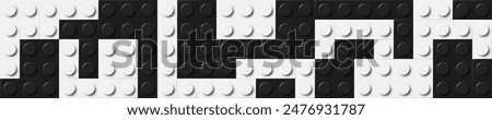Many plastic building toy blocks banner. Background of bricks in black and white colors. Close-up of bricks viewed from above. Abstract vector background illustration