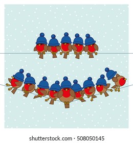 Many Robin Red Breasts wearing Blue Woolly Bobble Hats sitting on a couple of Telephone Wires with Snowing Background