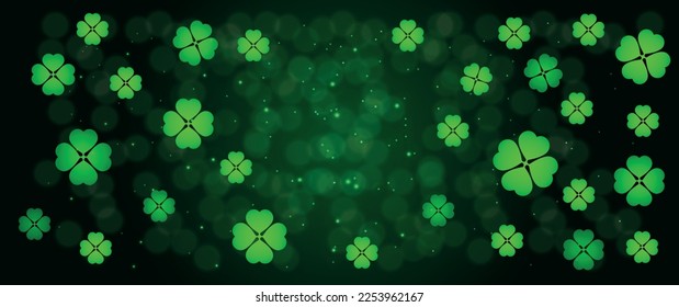 Many shamrock leaves on dark background. St. Patrick's Day celeb