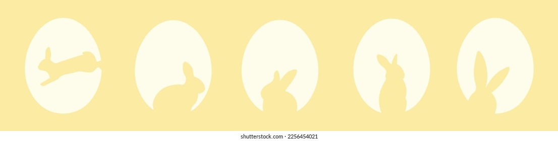 Many silhouettes of bunnies and Easter eggs on yellow background