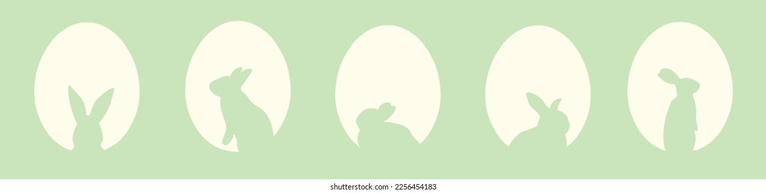 Many silhouettes of bunnies and Easter eggs on green background