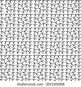 Many small objects form a pattern and curl slightly.