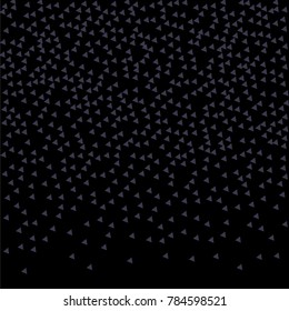Many Small Violet Confetti in the Form of Triangles with Decreasing Density to the Bottom of the Image on Black Background