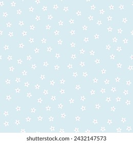 Many small white flowers isolated on a pastel blue background. Flat style. Seamless pattern. Delicate background for paper, cover, fabric, textile, dishes, interior decor.