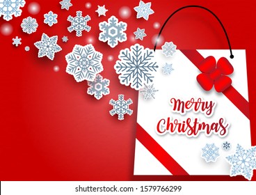 Many and variety snowflake in paper cut style with Merry Christmas lettering on white shopping bag and blue background. Christmas greeting card and poster in vector design.