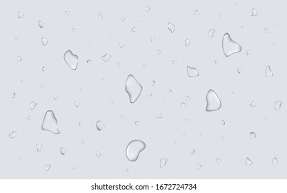 Many water drops on grey background. Realistic pure droplets. Clear vapor water bubbles on window glass. Raindrops Or Vapor Trough Window Glass